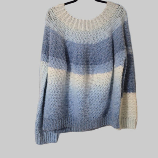 Handmade multi-colored blue pull-over sweater with long sleeves, soft yarn.