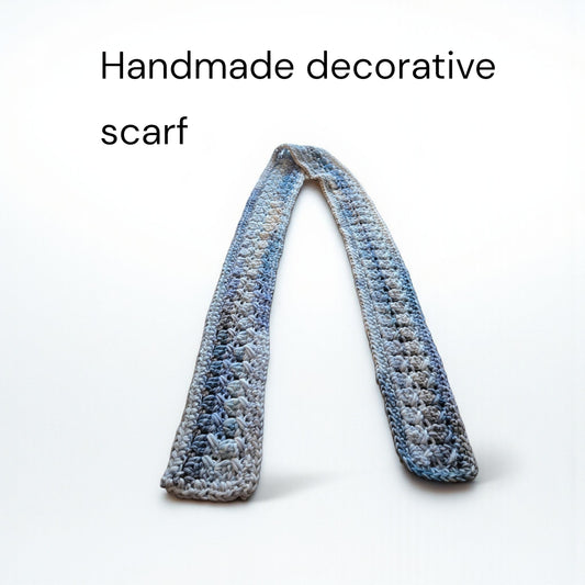 Handmade decorative scarf multi-colored in blues, grays and cream.