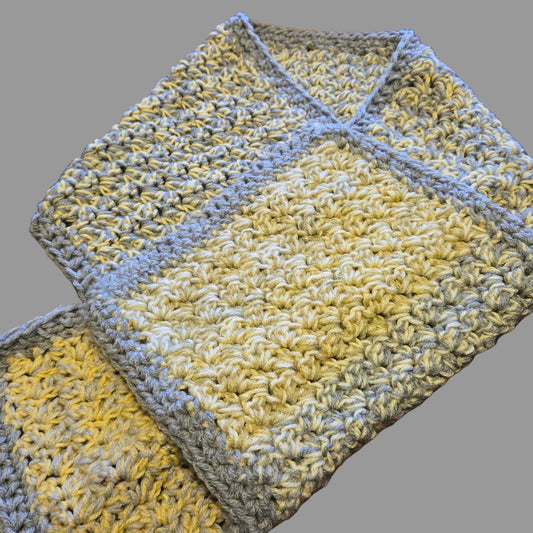 Handmade keyhole scarf measures 38 x 8 inches. Multi-colored in: yellow, brown, tan, gray and green. Size Large/XXL