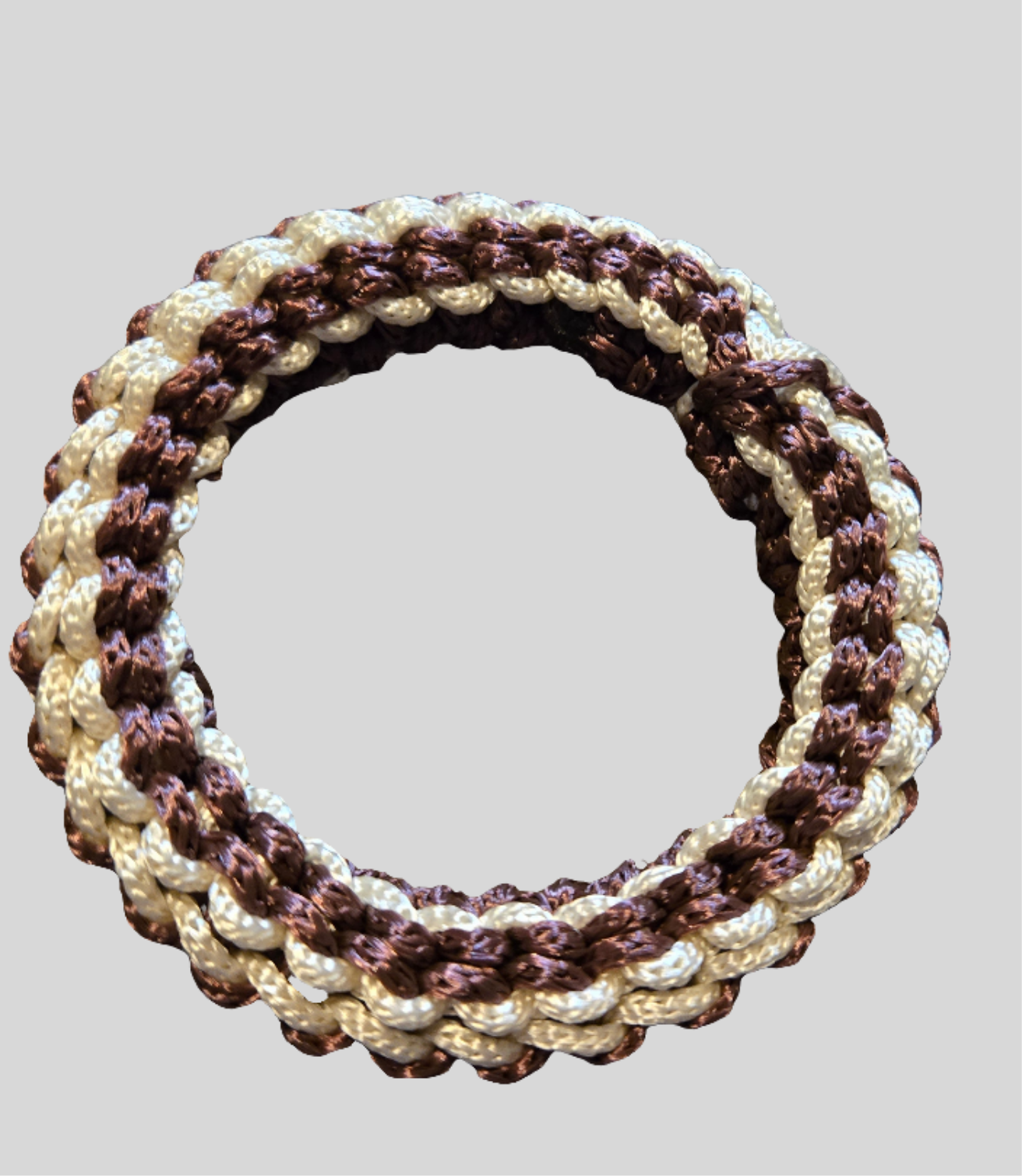 Handmade crochted brown and white bangle bracelet.