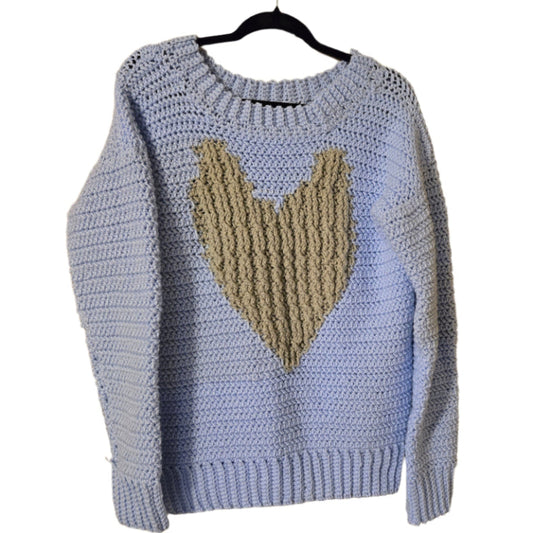 Pull over sweater light blue with a tan heart.