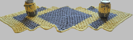 Table runner gray and white with two teal candles included 