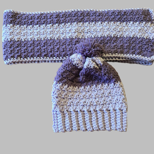 Womans hat and scarf set in light purple and violet, cozy winter accessories.