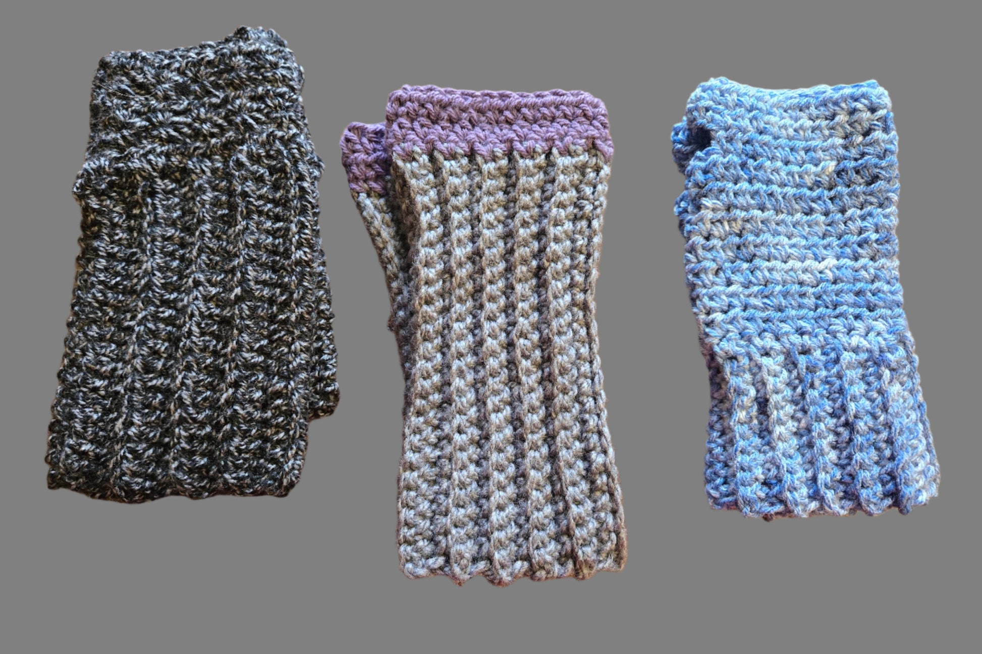 Handmade fingerless gloves in gray, purple, and blue for convenient warmth and style.