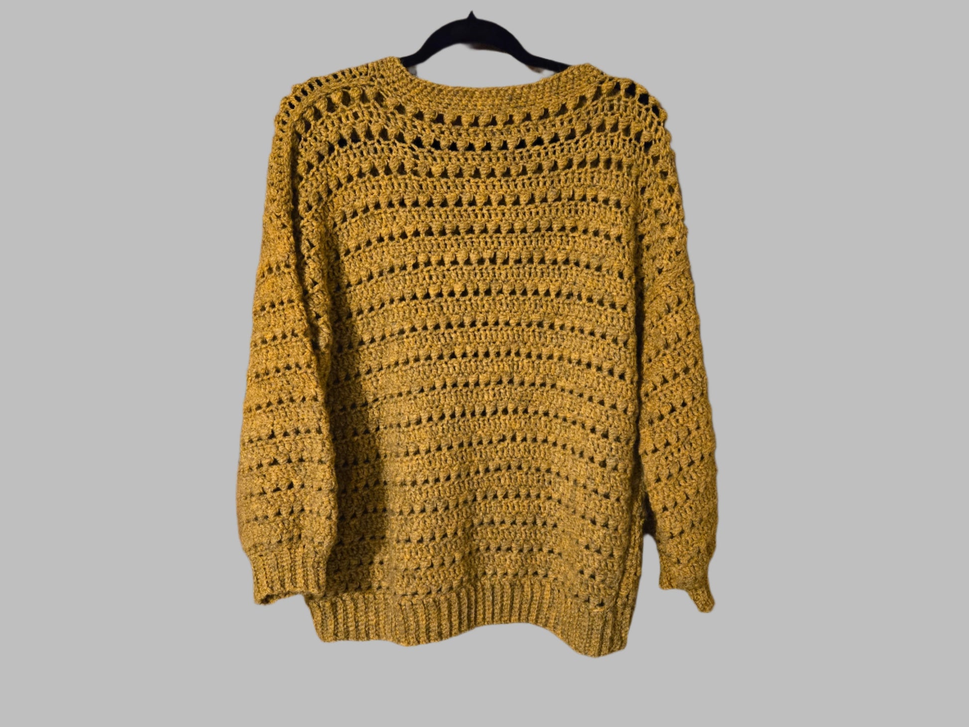 Handmade mustard pullover sweater, cozy and stylish for chilly days.