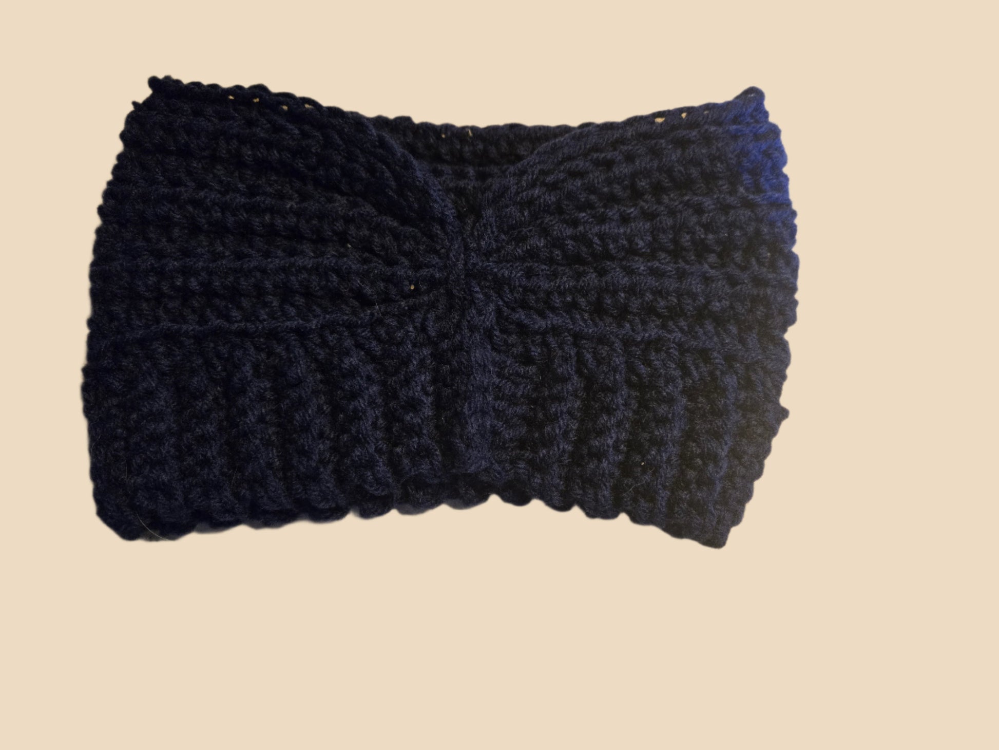 Dark blue crocheted winter head band, 19–20 inches in circumference, 8–9 inches wide.