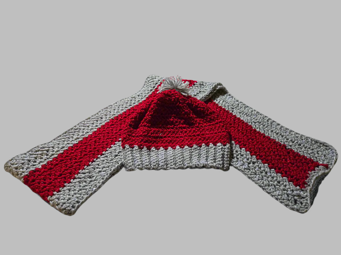 Silver and red hat and scarf set with stretchable yarn.