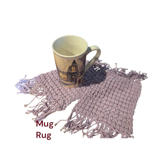 Set of two violet handmade cotton coffee lovers mug rugs with fringed edges and textured weave, ideal for oversized mugs and spoons