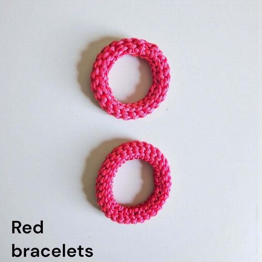 Handmade red bangle bracelets made from stretchable polyester cord