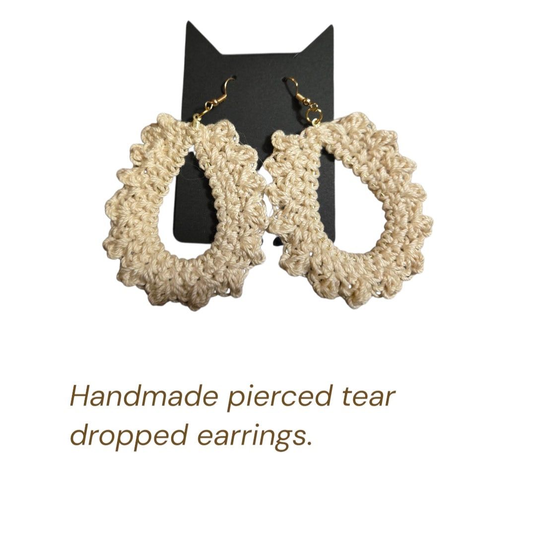 Handmade beige earrings  tear drop design