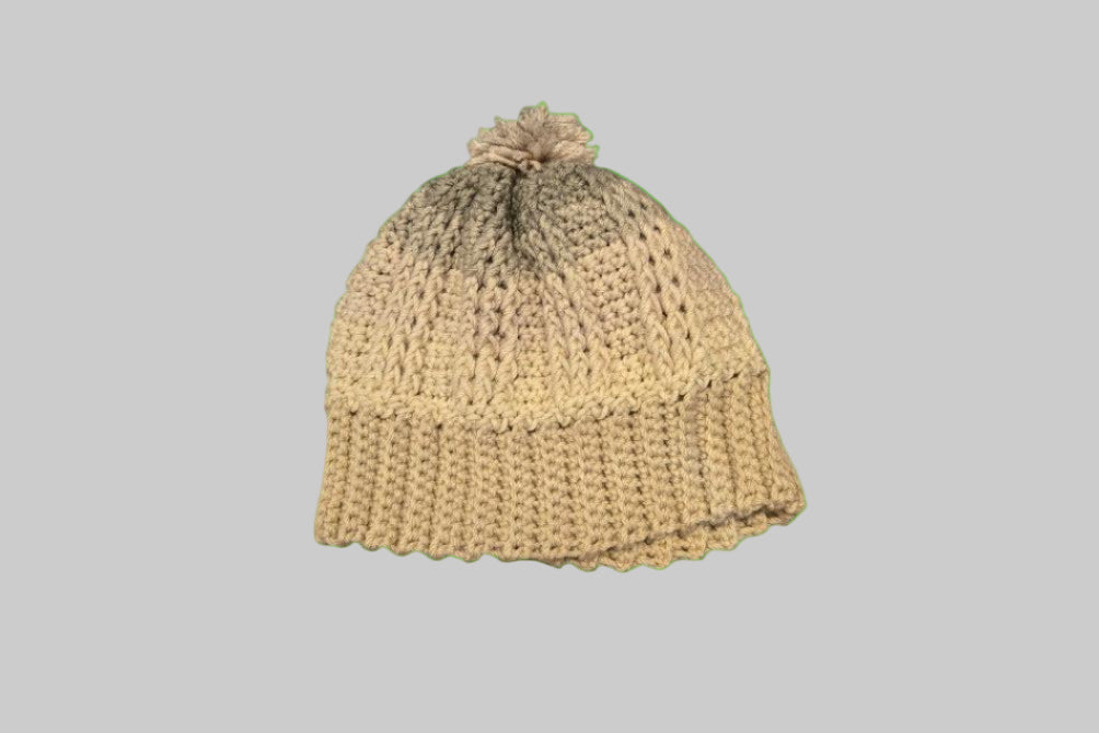 Beige knitted winter hat on a white background with 'winter hat' text.