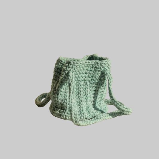 Handmade child's bucket purse with vinyl base.