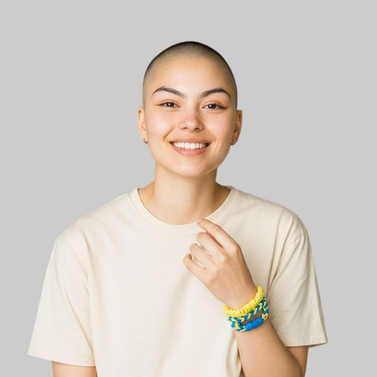 Model wearing handmade bangle bracelet made from macrame cord. 