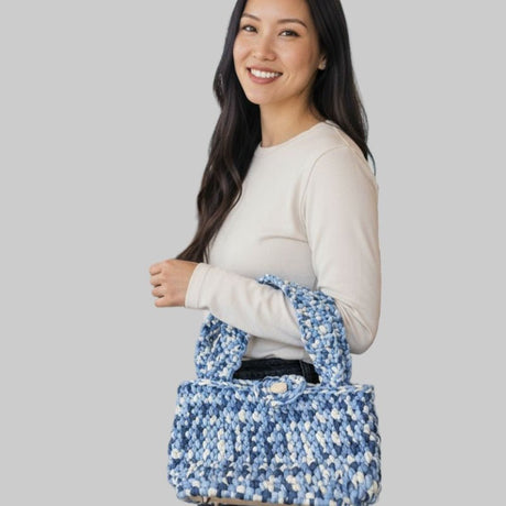 Purse made with t-shirt yarn with wood base and button closure - Stitched Creations