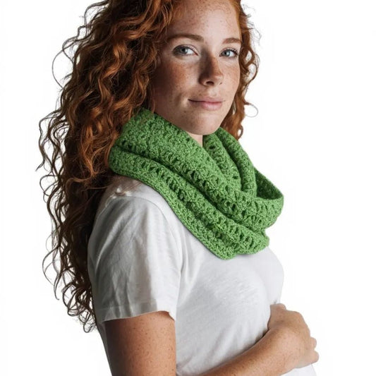 Bright green light weight wrap or scarf.  Measures 58 inches in length and 11 inches wide.