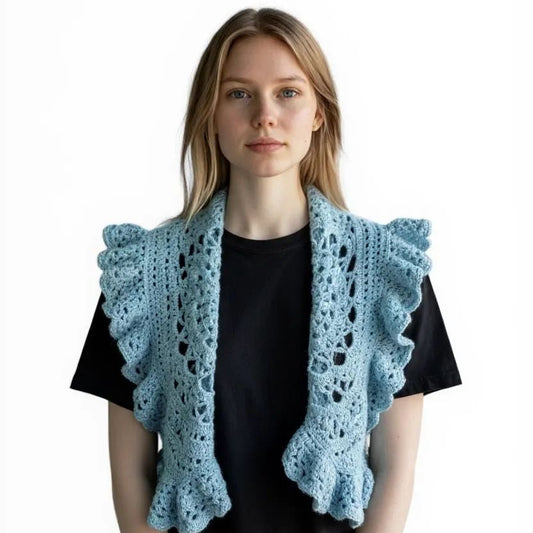 Blue ruffled vest light mint in color size small.