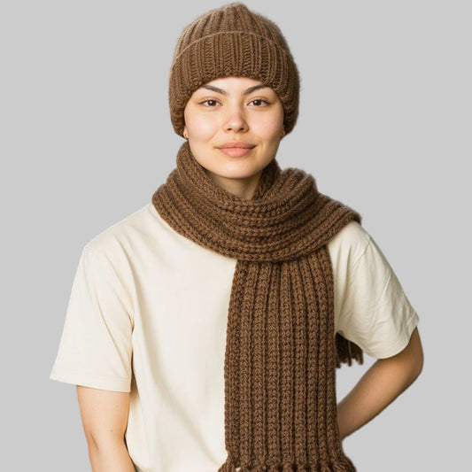 Handmade wool scarf with fringe and winter hat color is brown.