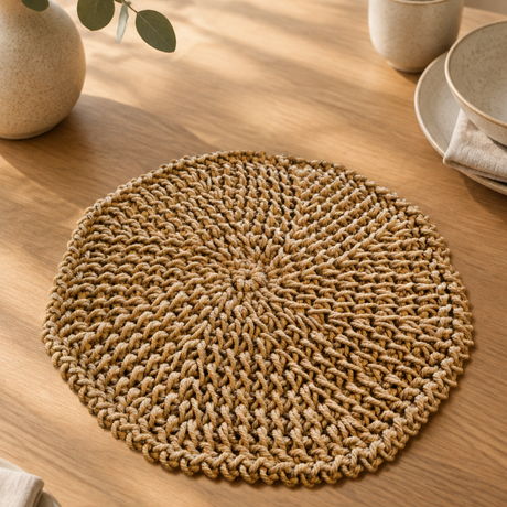 Brown octagon macramé placemat styled on a neutral dining table